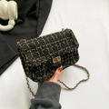 Elegante schwarz-goldene Tweed-Tasche mit Kettenriemen und Metall-Drehverschluss - Schwarz