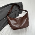 Chic dark brown faux leather crescent tote bag with polished finish and adjustable strap - Dark Brown