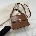 Elegant caramel brown PU leather crossbody bag with golden horseshoe metal buckle - Tan
