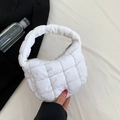 Quilted white puffer handbag with minimalist padded design and curved handle - White