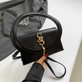 Borsa a tracolla in pelle nera con manico rotondo, logo S dorato e dettaglio nappine - Nero