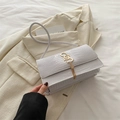 Minimalist white faux leather shoulder bag with crocodile texture and gold tassel charm - White
