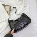Fashionable black sequin shoulder bag with silver chain strap on a white stylish background - Black