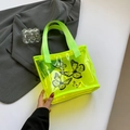 Neon green transparent PVC tote bag featuring black butterfly patterns and nylon handles - Green