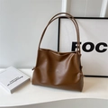 Minimalist deep brown soft faux leather tote bag with unique knot details on the sides - Brown