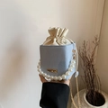 Light blue faux leather chain bag with pearl handle and cream drawstring insert - Blue