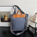 Minimalistische grijze canvas shopper met bruine leren handvatten en schouderband - Blauw