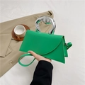 Bright green crossbody flap bag featuring a unique liquid silver metal top handle - Green