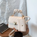 Cream white quilted crossbody bag with golden heart buckle and ruched handle - White