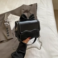 Chic black crossbody bag with large bow decoration and silver chain strap for women - Black