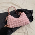 Pale pink bubble textured shoulder bag with a cute rabbit charm and sleek crescent shape - Pink