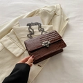 Dark brown faux leather crossbody bag with crocodile texture and metal buckle strap - Brown