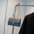 Dark gray crossbody bag with blue floral patterns and elegant gold chain strap - Black
