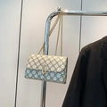 Women's cream white crossbody chain bag with navy clover geometric patterns - White