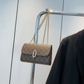 Classic vintage brown crossbody bag with clover pattern and gold chain strap - Brown