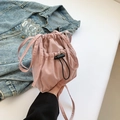 Pink drawstring bucket bag in lightweight nylon with adjustable front pocket detail - Pink