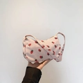 Pink corduroy crescent bag featuring red strawberry prints and golden zipper closure - Pink