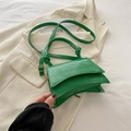 Vibrant green crocodile pattern leather crossbody handbag with knotted handle design - Green
