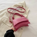 Rose red faux crocodile leather handbag with curved base and knotted handle detail - Rose Pink