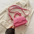 Pink lychee grain leather crossbody bag with top handle and adjustable shoulder strap - Rose Pink