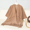Detailed knit pattern and fine fringe tassels on a brown open-front hollow poncho - Letter F / Khaki