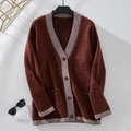 Detail of burgundy knit cardigan featuring striped trims and vintage round buttons - S / Brown