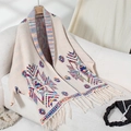 Aztec knit cardigan with geometric jacquard patterns and fringe trim in beige - Letter F / Apricot