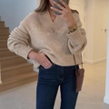 Women's oatmeal V-neck loose knit sweater paired with slim fit navy denim jeans - S / Khaki