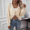 Elegante cárdigan de punto crema con escote en V y cordones frontales para mujer - S / Albaricoque
