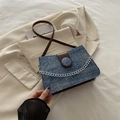 Borsa a tracolla in denim blu navy con finiture in pelle marrone e paillettes - Blu