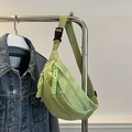 Light green nylon sports fanny pack with adjustable strap and braided zipper pulls - Green