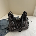 Large leopard print canvas tote bag with black leather handles and dual zippers - Tan