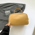 Chic yellow litchi grain leather handbag with top handle and mudailun branding - Khaki