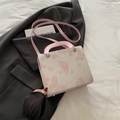 Borsa a tracolla chic bianco crema con farfalle rosa e anelli di metallo argento - Rosa