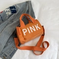 Sac bandoulière cylindre orange sportif avec motif PINK blanc et bandoulière réglable - Orange