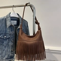 Deep brown pebble leather hobo bag with long fringes and knotted shoulder strap - Brown