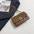 Brown quilted chain bag with gold U-shaped lock in minimalist urban style design - Brown