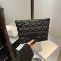 Chic black heart-quilted puffer handbag with glossy finish and zipper closure - Black