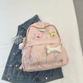 Sac à dos rose avec texture à volants 3D et breloques colorées en forme d'étoile et d'os - Sans Pendentif / Rose