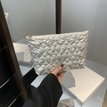 Quilted heart pattern white clutch bag with pearl finish and gold zipper closure - White