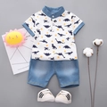 Jungen Freizeit Polo Set mit Dinosaurier Print und blauen Denim Shorts - Weiß / 110cm
