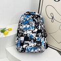 Mochila con grafiti negro y azul, estampado de camuflaje y colgante de astronauta - Azul