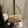 Minimalist beige leather shoulder bag with vintage gold D-buckle in retro style - Khaki