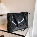 Black canvas tote bag with clear PVC window and side ribbon details for daily use - Black