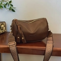 Vintage brown PU leather crossbody pillow bag with wide patterned strap and gold hardware - Brown