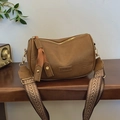 Brown vintage pillow bag in pleated leather with patterned wide woven crossbody strap - Khaki