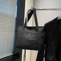Practical black canvas tote bag with side pockets and golden snap button for daily use - Black