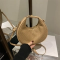 Beige crescent hobo bag with woven texture and matching top handle and shoulder strap - Khaki