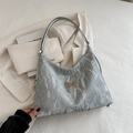 Silver metallic hobo tote bag with pleated texture and butterfly metal buckle detail - Silver