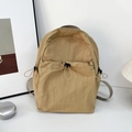 Minimalist khaki nylon backpack with front drawstring pocket and side elastic pouches - Khaki
